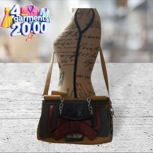 Nicole Lee bag. Can be used as a shoulder bag or handbag